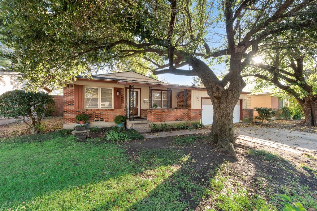 11310 Sinclair Avenue Dallas, TX 75218 - Photo 2 of 26 a view of a house with a yard