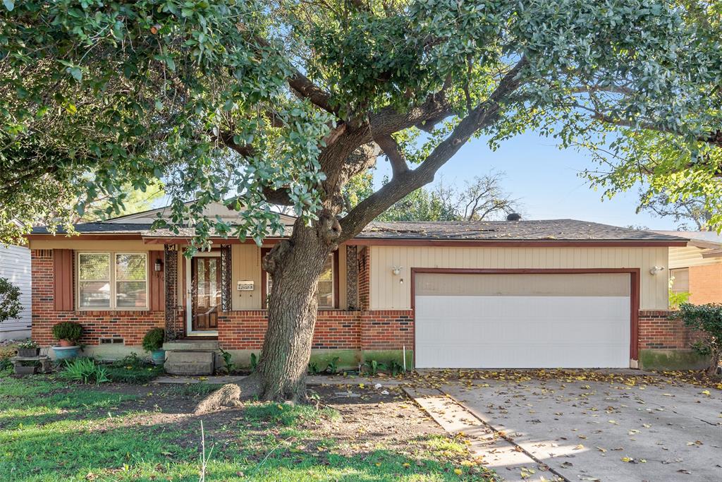 11310 Sinclair Avenue Dallas, TX 75218 - Photo 26 of 26 a front view of a house with garden