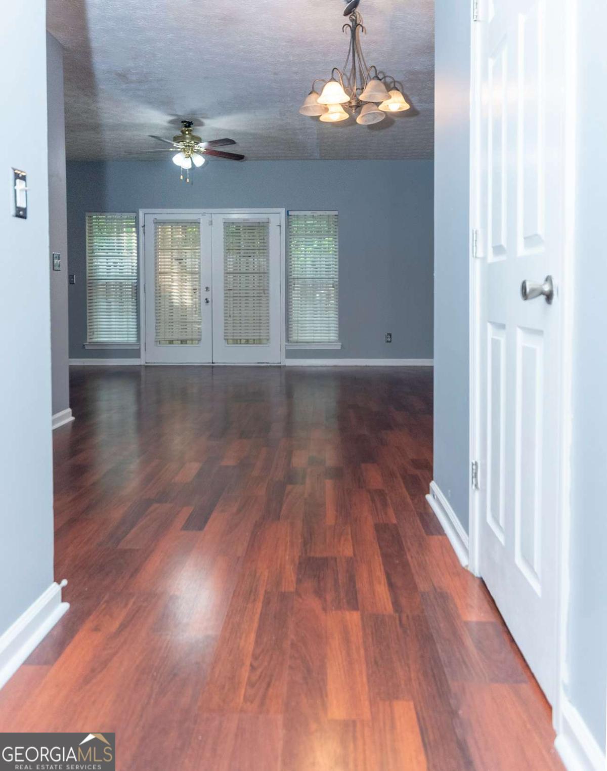 4123 Stone Trace Drive East Point, GA 30344 - Photo 20 of 24 a view of empty room with wooden floor and fan