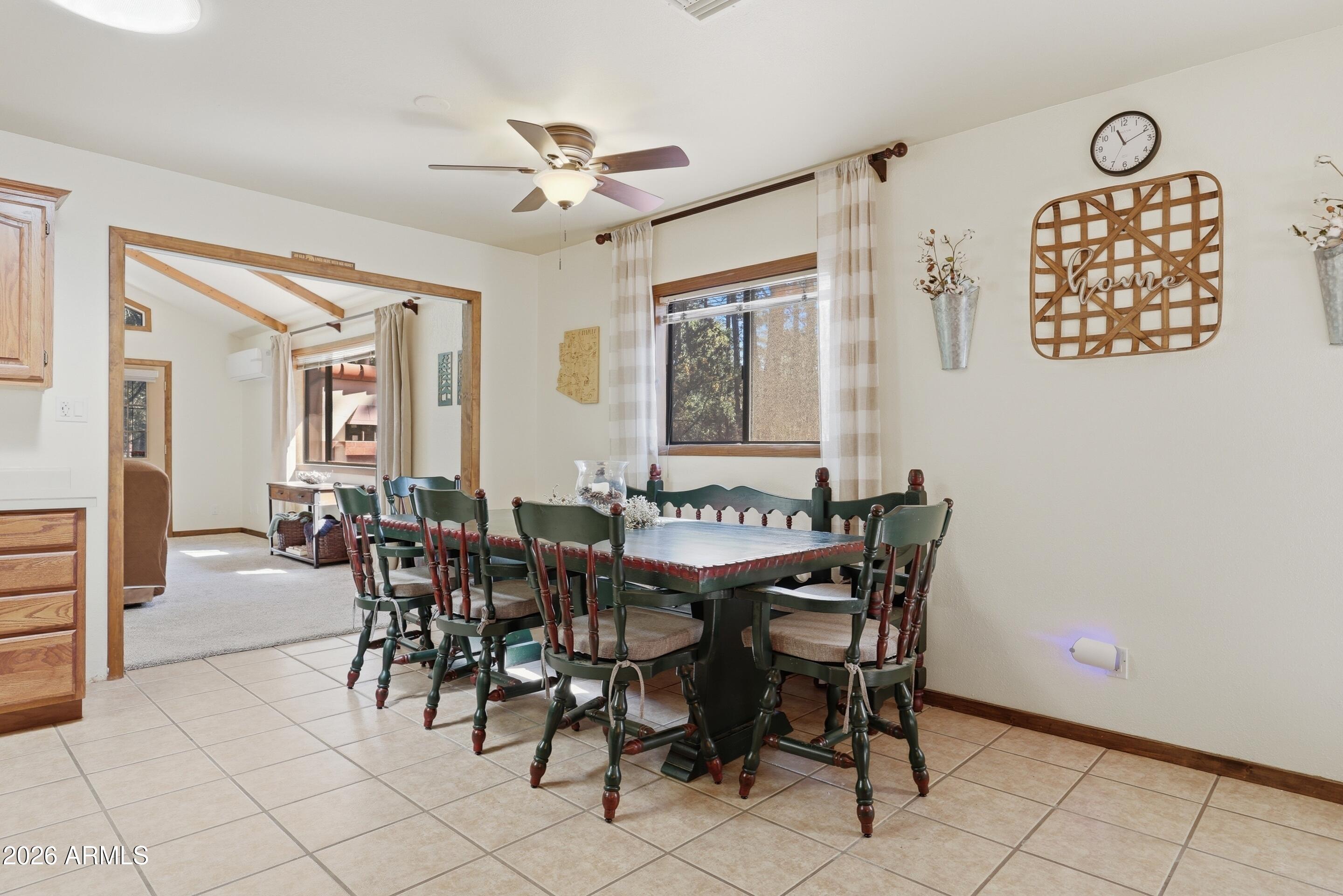 6740 Ridge Road Pine, AZ 85544 - Photo 9 of 35 a view of a dining room with furniture and chandelier