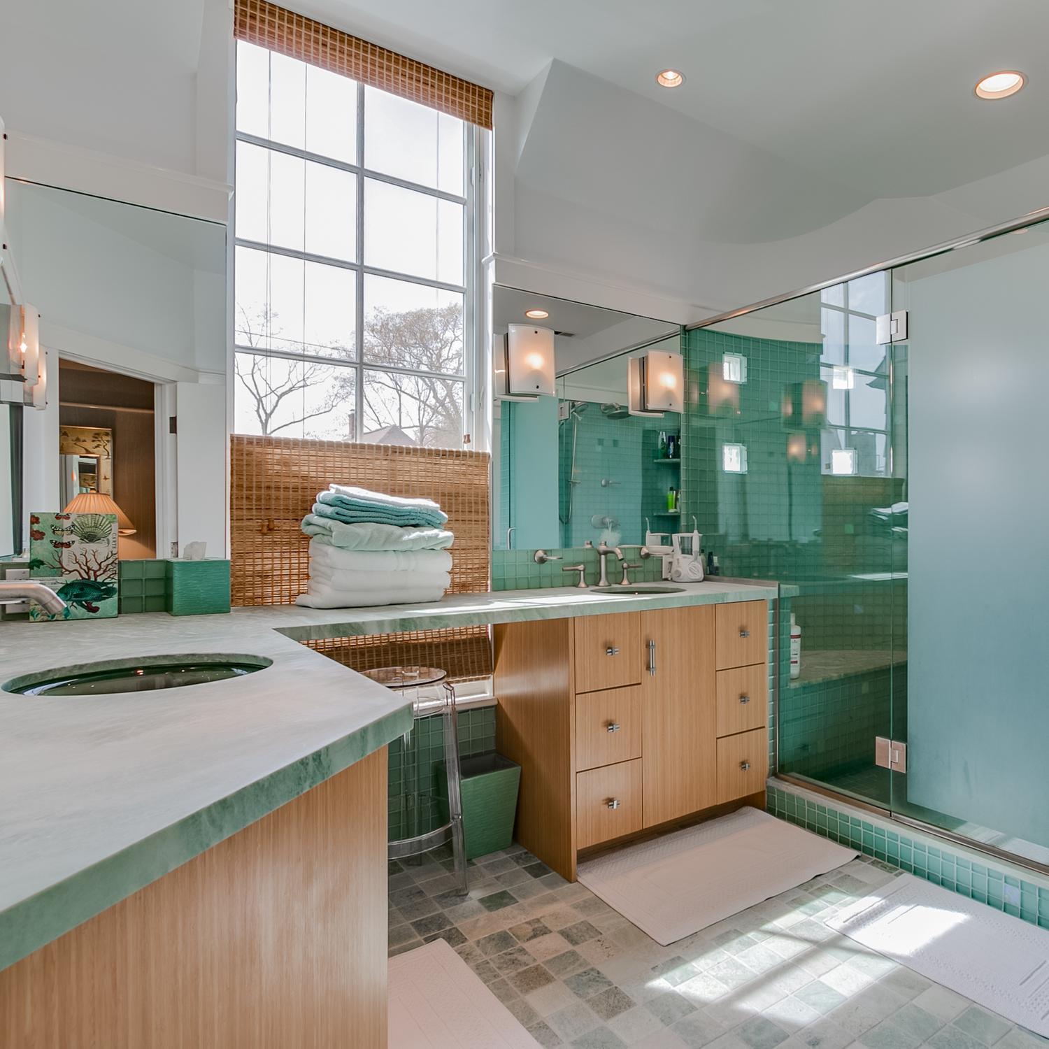 38 Nearwater Road Rowayton, CT 06853 - Photo 25 of 37 a spacious bathroom with a granite countertop sink and a large mirror