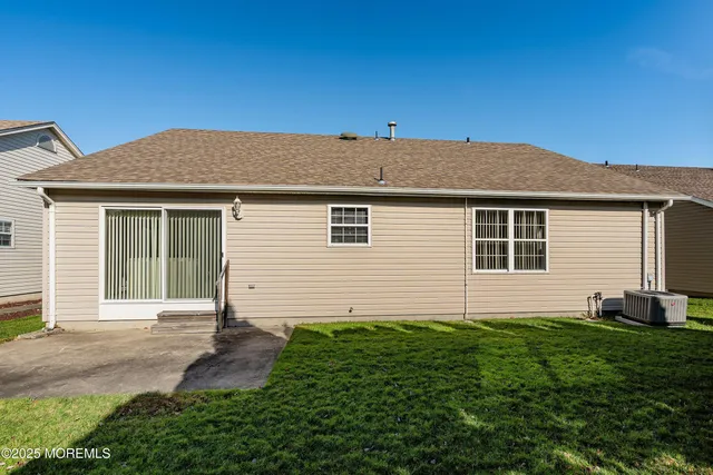 a house view with a backyard space
