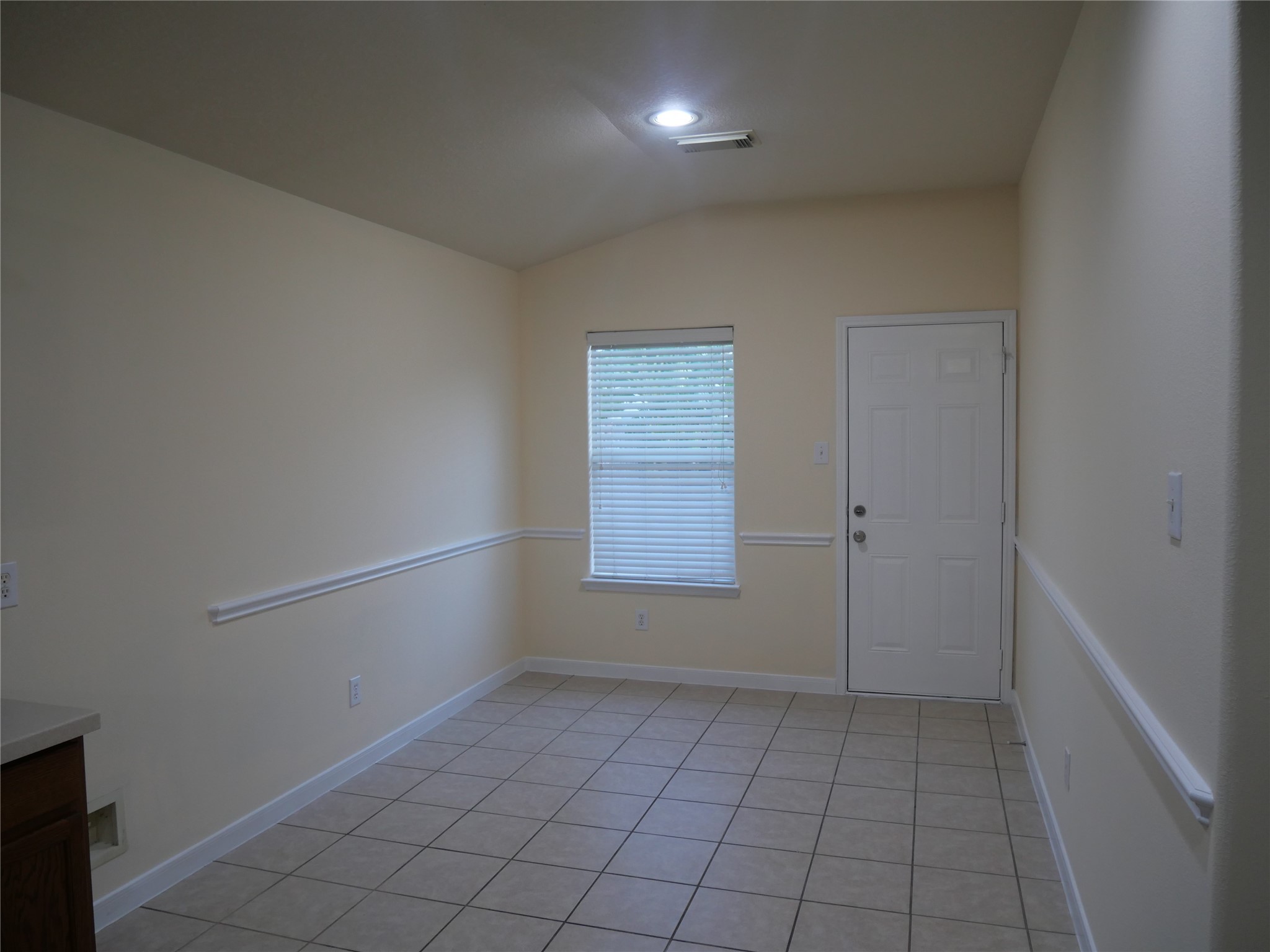 2726 Heatherwind Lane Houston, TX 77047 - Photo 12 of 27 a view of an empty room and window