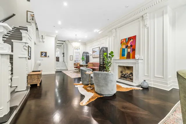 a living room with furniture and a rug