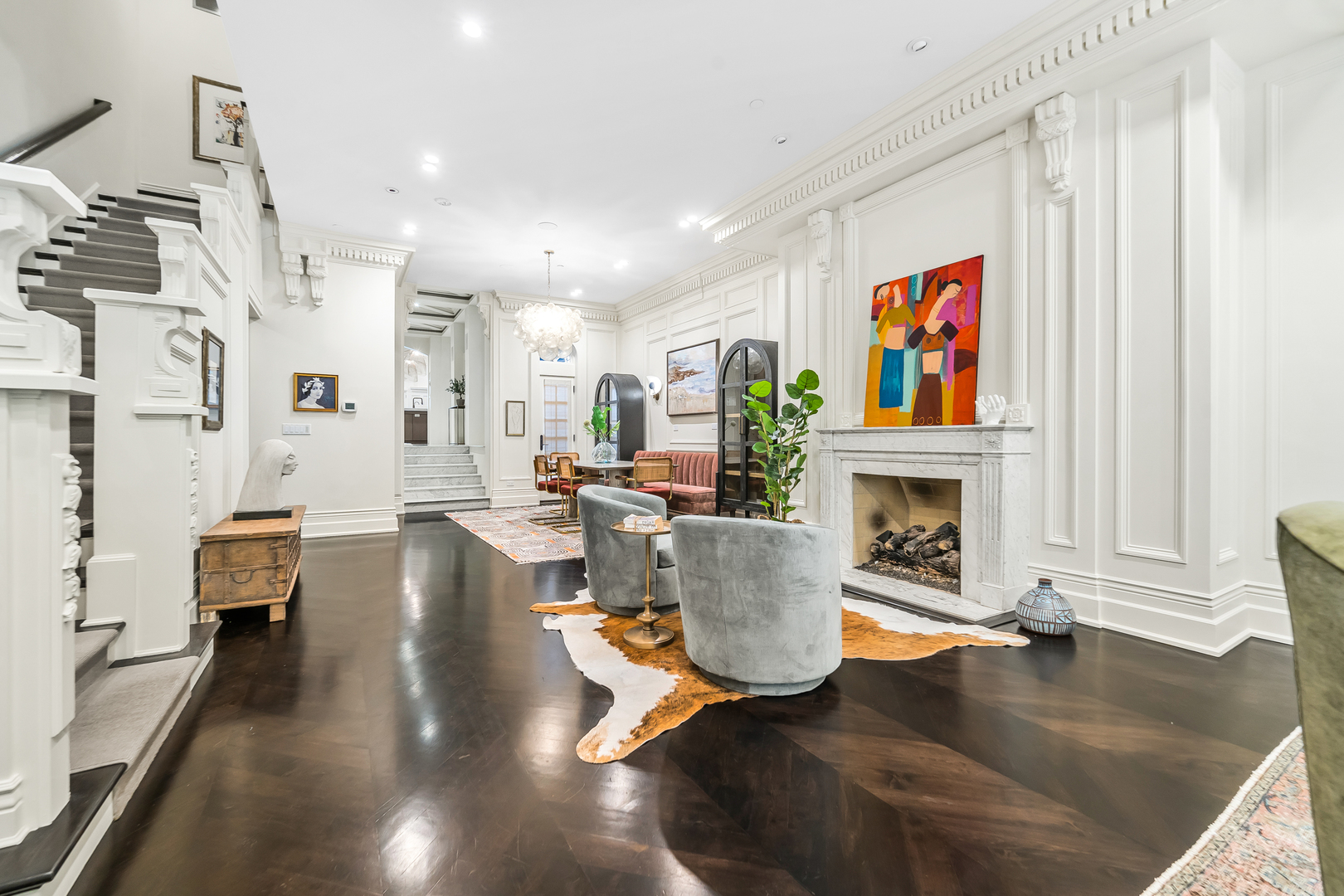 53 East Division Street Chicago, IL 60611 - Photo 11 of 79 a living room with fireplace furniture and a chandelier