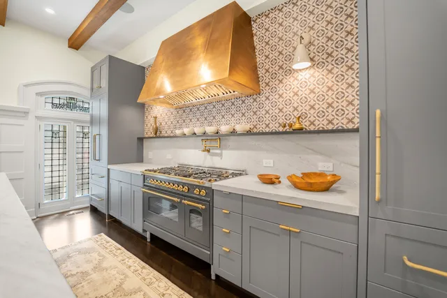 a bedroom with a bed and a television