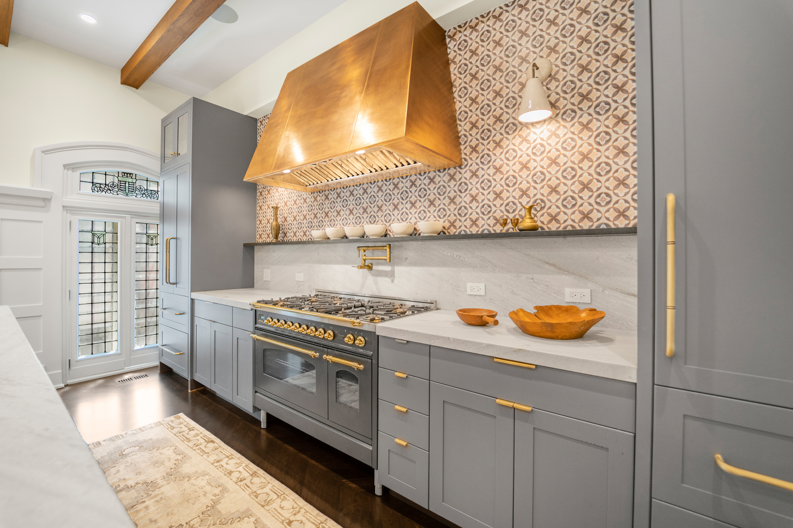 53 East Division Street Chicago, IL 60611 - Photo 21 of 79 a kitchen with stainless steel appliances granite countertop a stove and a wooden cabinets