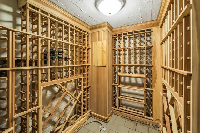 a bedroom with furniture and a flat screen tv