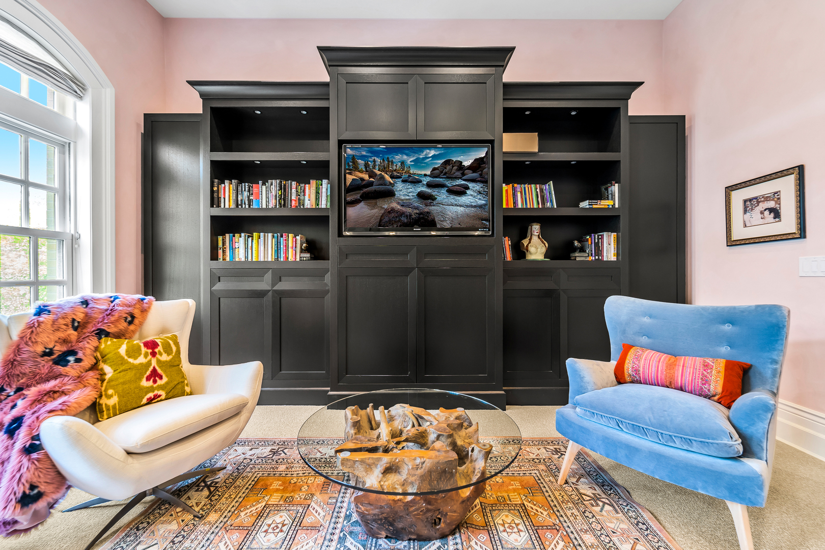 53 East Division Street Chicago, IL 60611 - Photo 29 of 79 a living room with furniture a rug and a book shelf