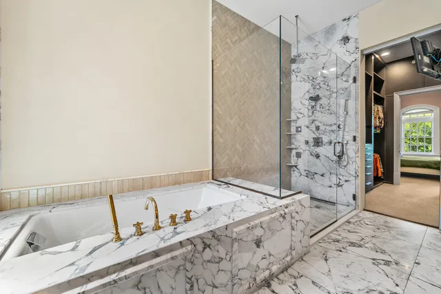 a view of a glass door with a lake view