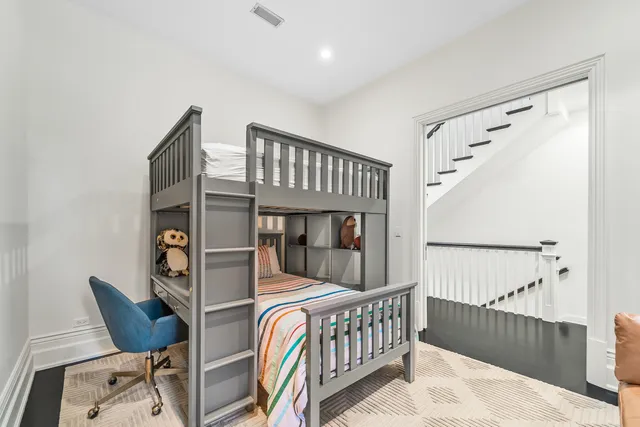 a view of a patio with table and chairs and potted plants