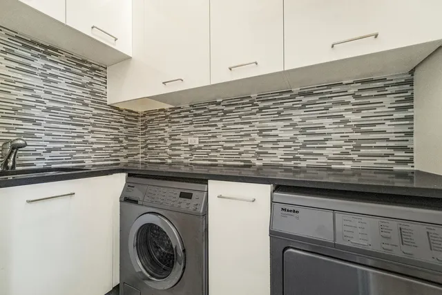 a white and white photo of a living room