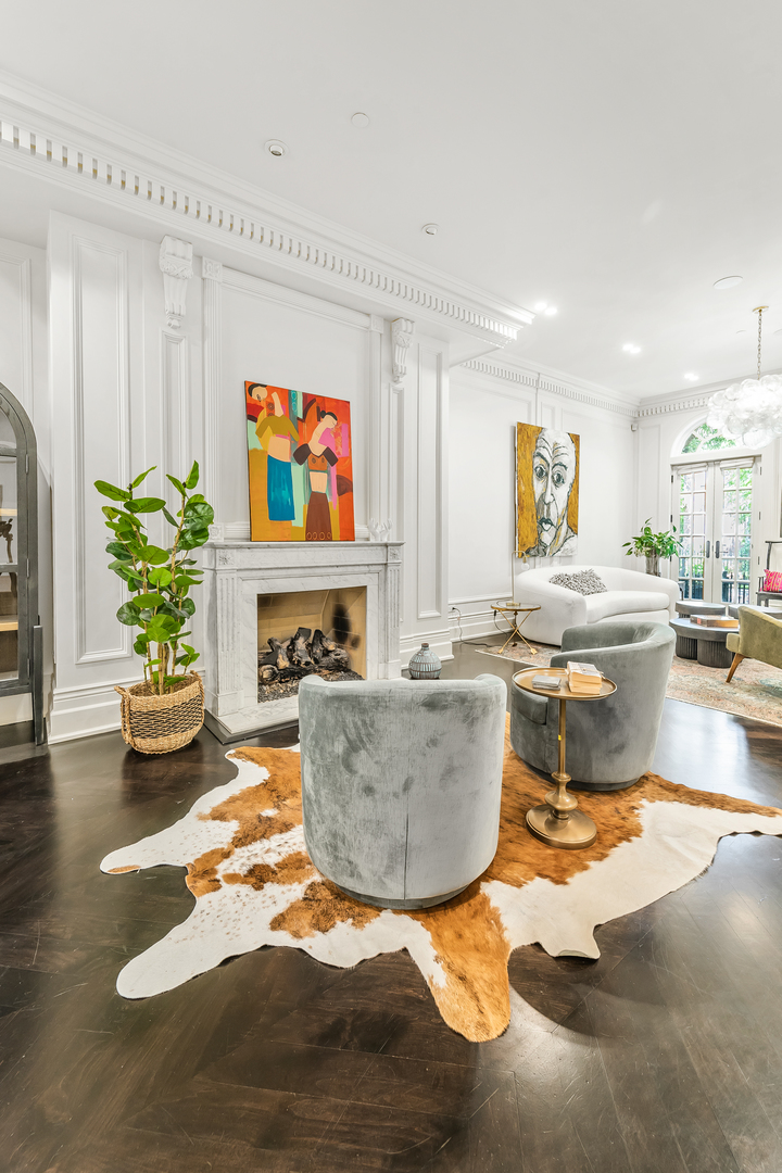 53 East Division Street Chicago, IL 60611 - Photo 8 of 79 a living room with fireplace furniture and a fireplace