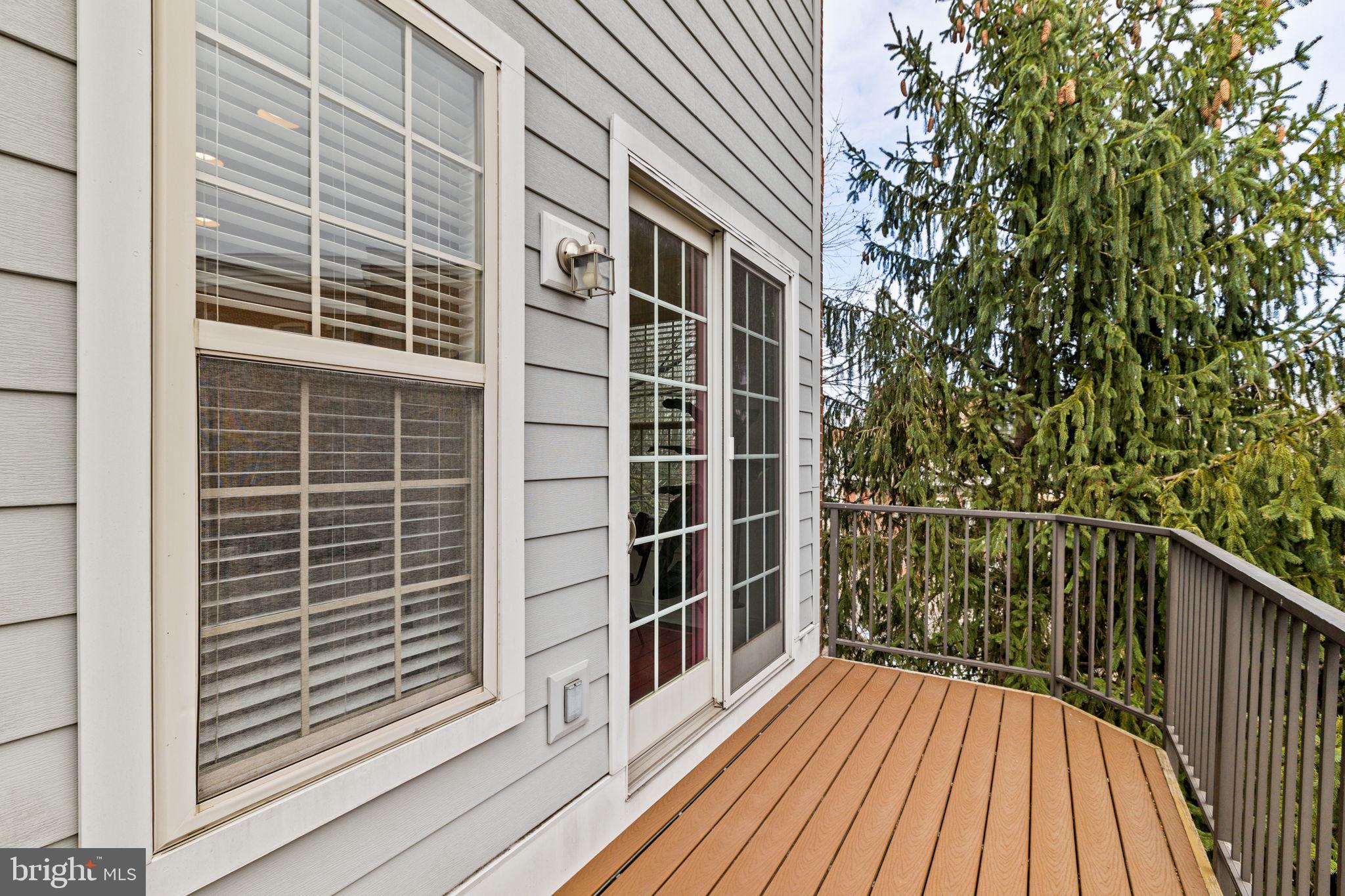508 Governors Court Philadelphia, PA 19146 - Photo 13 of 54 a view of balcony with wooden floor and fence