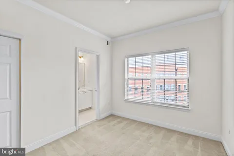 a view of a bathroom with a shower and a toilet