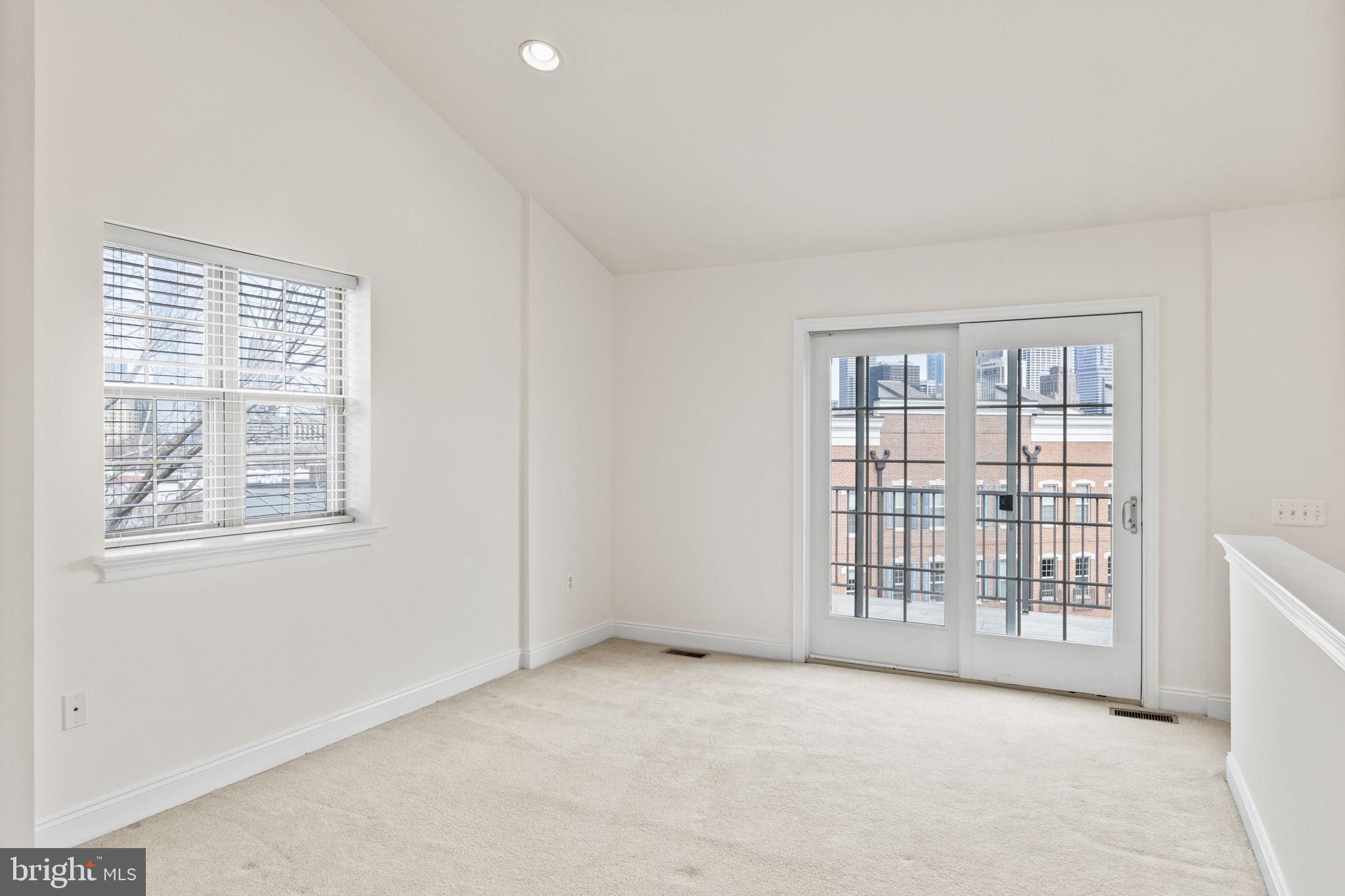 508 Governors Court Philadelphia, PA 19146 - Photo 27 of 54 an empty room with windows
