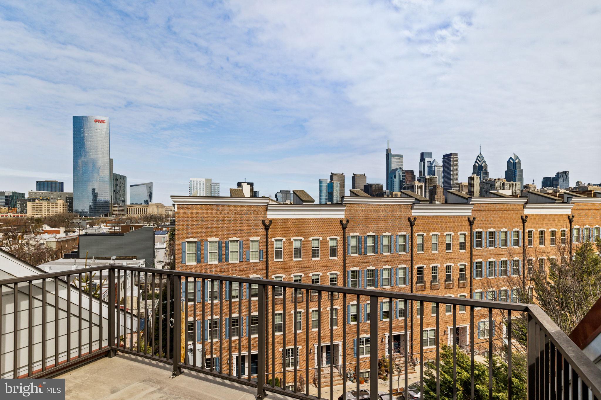 508 Governors Court Philadelphia, PA 19146 - Photo 29 of 54 a view of a large building with a city view