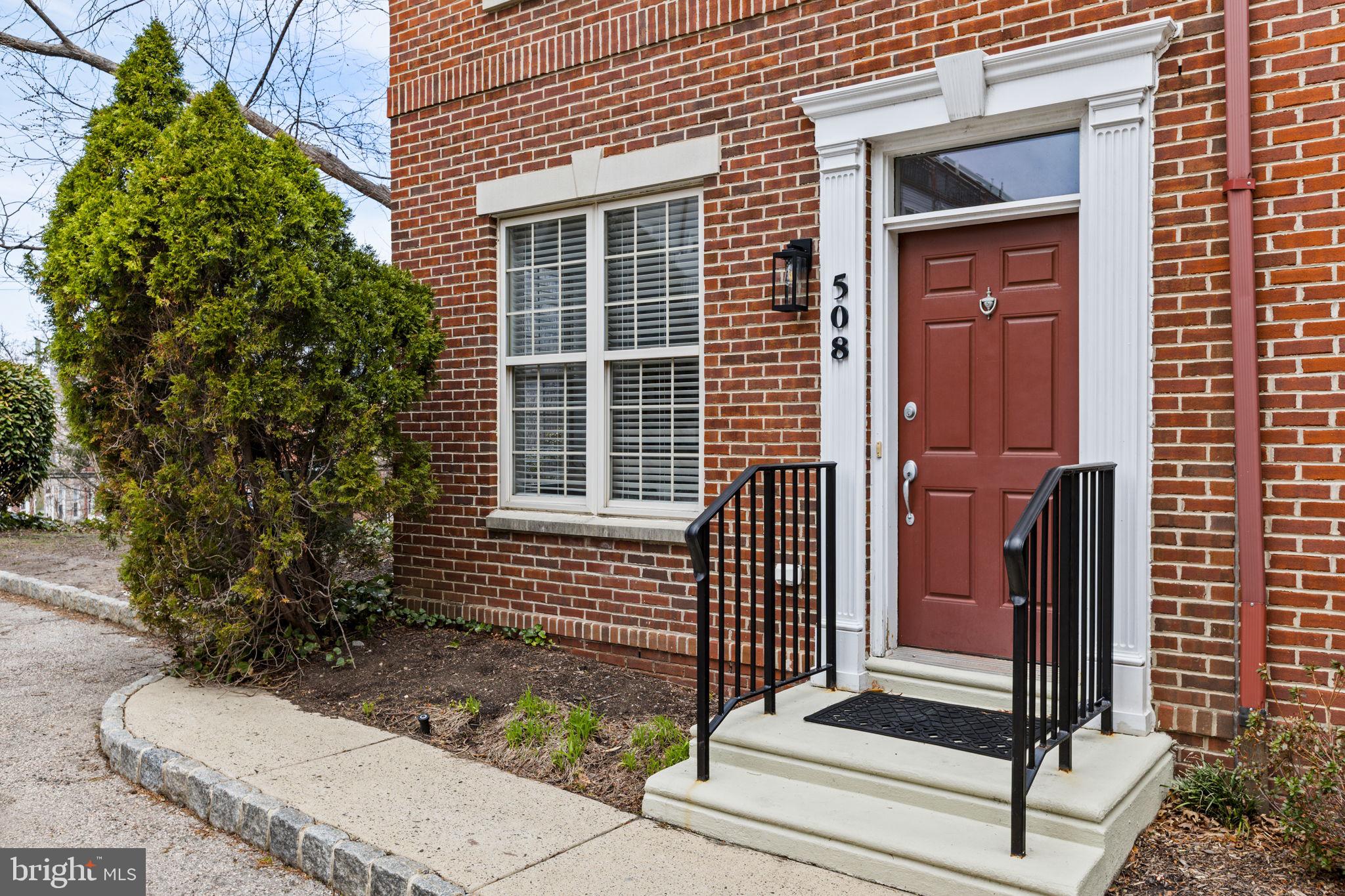 508 Governors Court Philadelphia, PA 19146 - Photo 32 of 54 a front view of a house with a yard