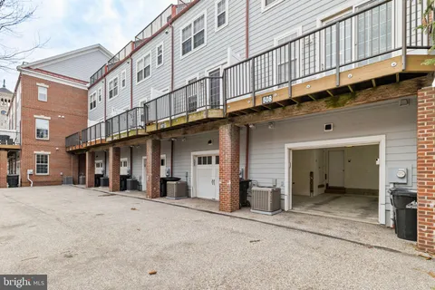 a view of a park with large trees