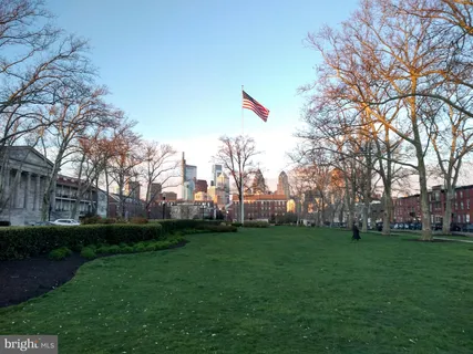 a view of city with tall buildings