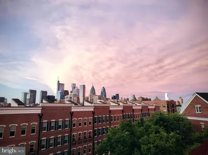 a view of a city with tall buildings