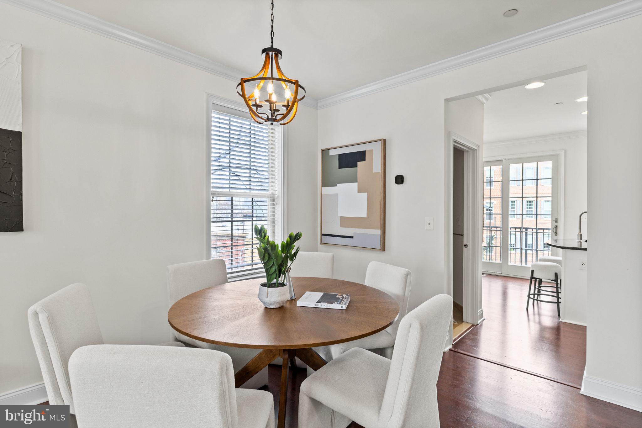 508 Governors Court Philadelphia, PA 19146 - Photo 8 of 54 a view of a dining room with furniture wooden floor and chandelier