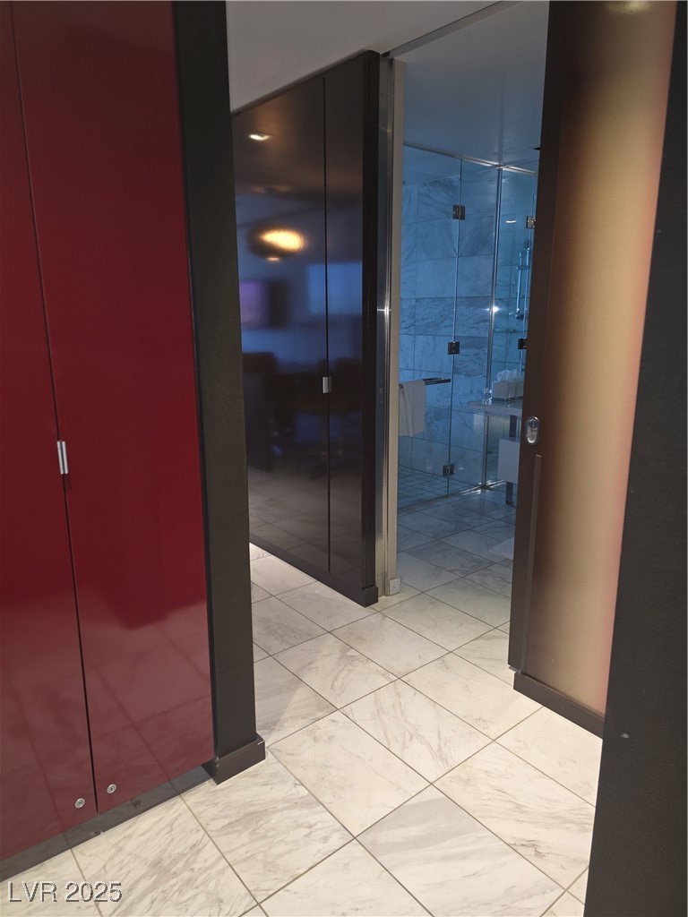 4381 West Flamingo Road, Unit 3109 Las Vegas, NV 89103 - Photo 20 of 28 Hall with marble finish floor
