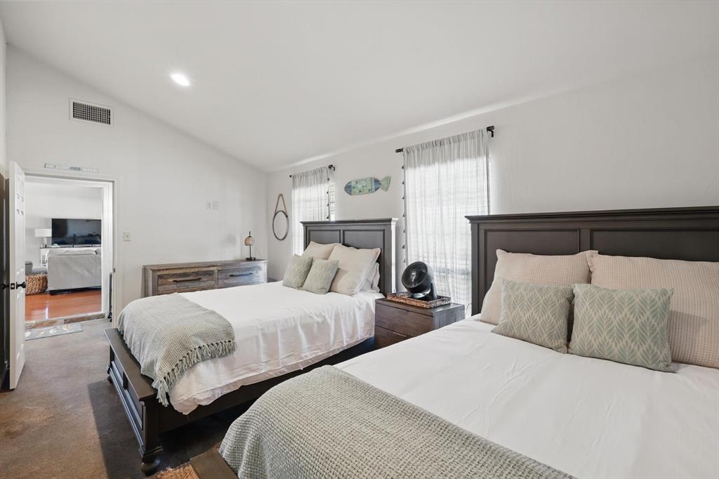 186 West Hells Gate Drive Strawn, TX 76475 - Photo 19 of 40 a bedroom with two beds and painting on the wall