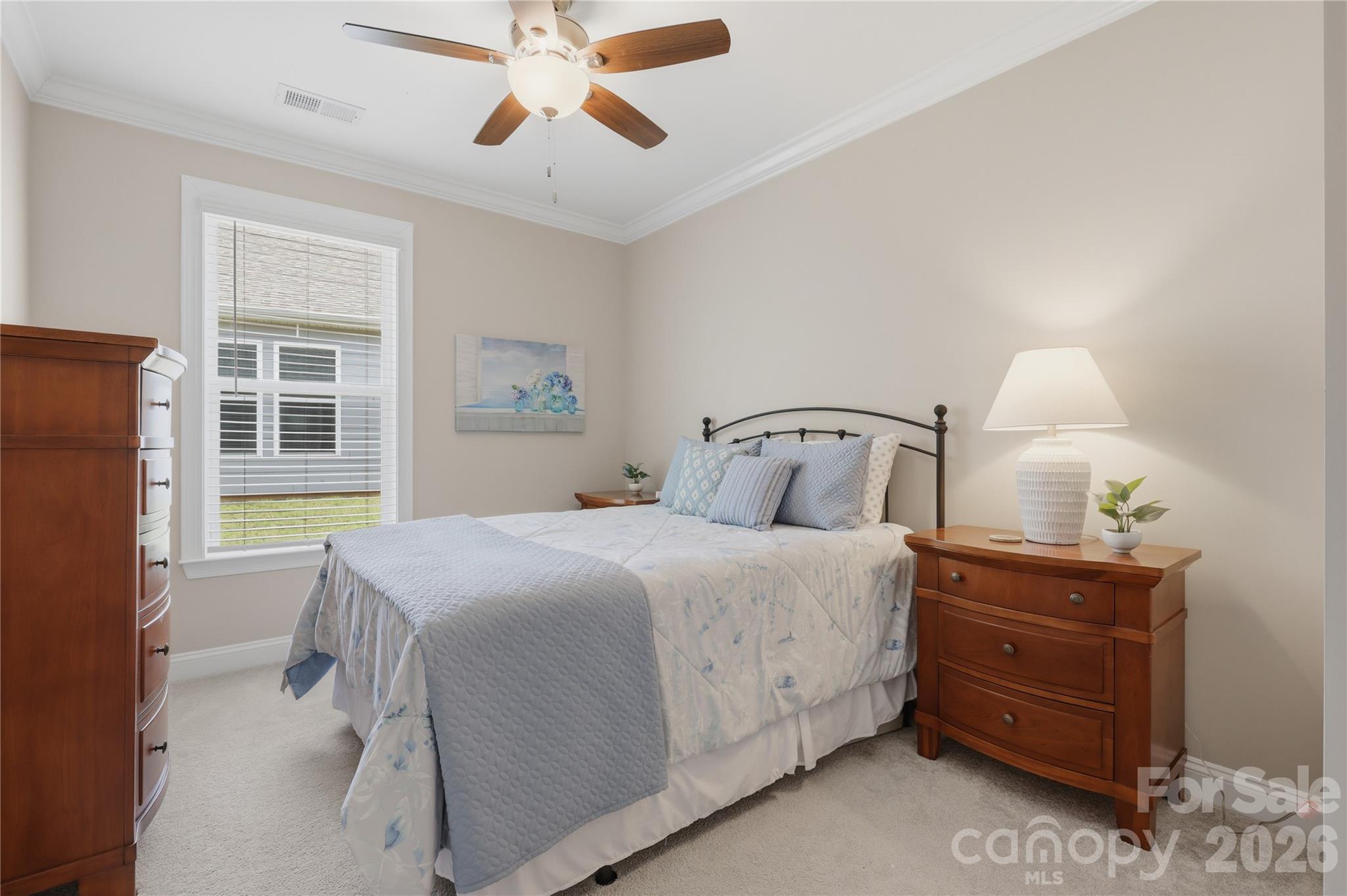 3023 Eagle Ridge Lane Indian Trail, NC 28079 - Photo 45 of 47 a bedroom with a bed and window