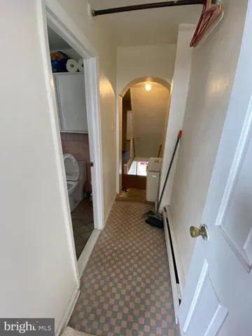 a view of a hallway view with staircase