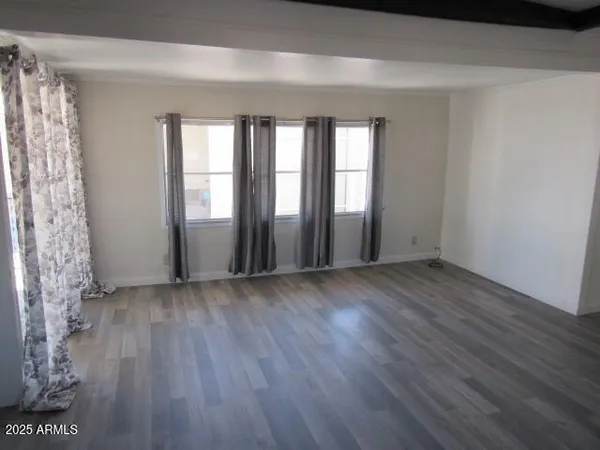 a view of livingroom with hardwood floor and window