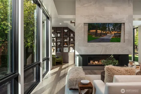 a view of a dining room with furniture wooden floor and next to a window