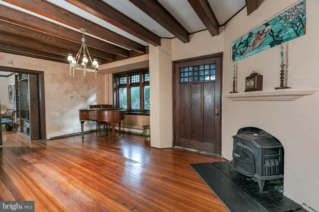 a view of a livingroom with furniture and a fireplace