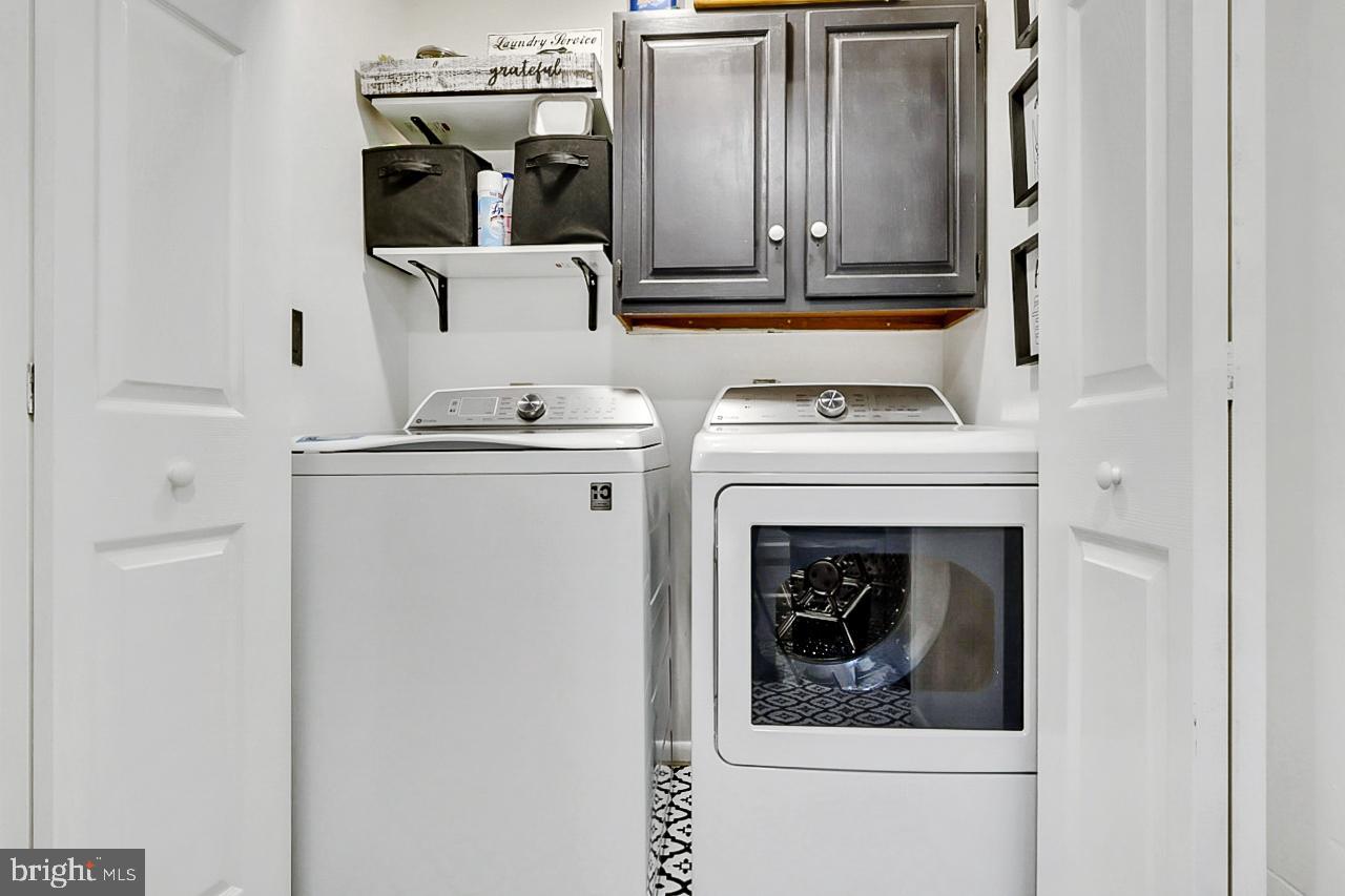 38340 Sugar Hole Road Avenue, MD 20609 - Photo 18 of 32 a stove top oven sitting inside of a kitchen