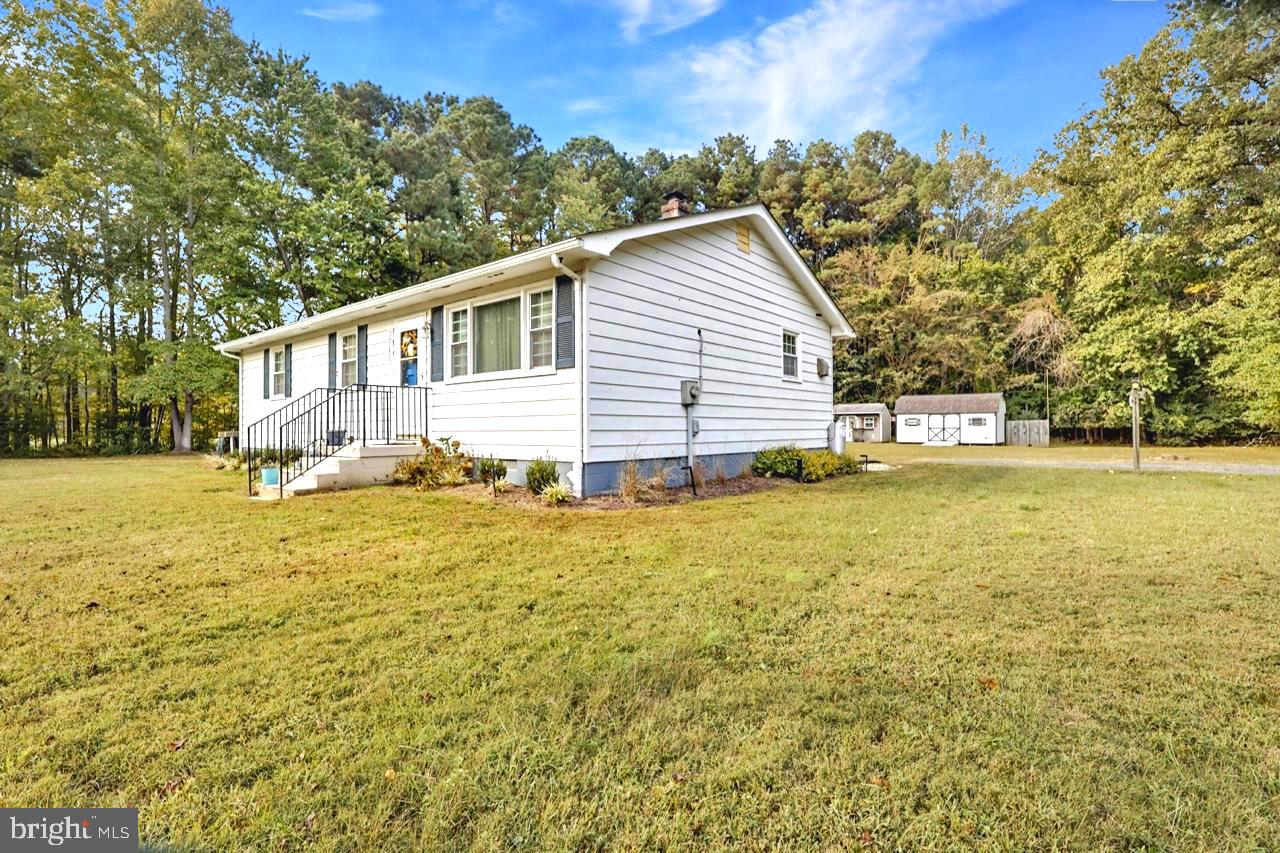 38340 Sugar Hole Road Avenue, MD 20609 - Photo 2 of 32 a view of a house with a yard