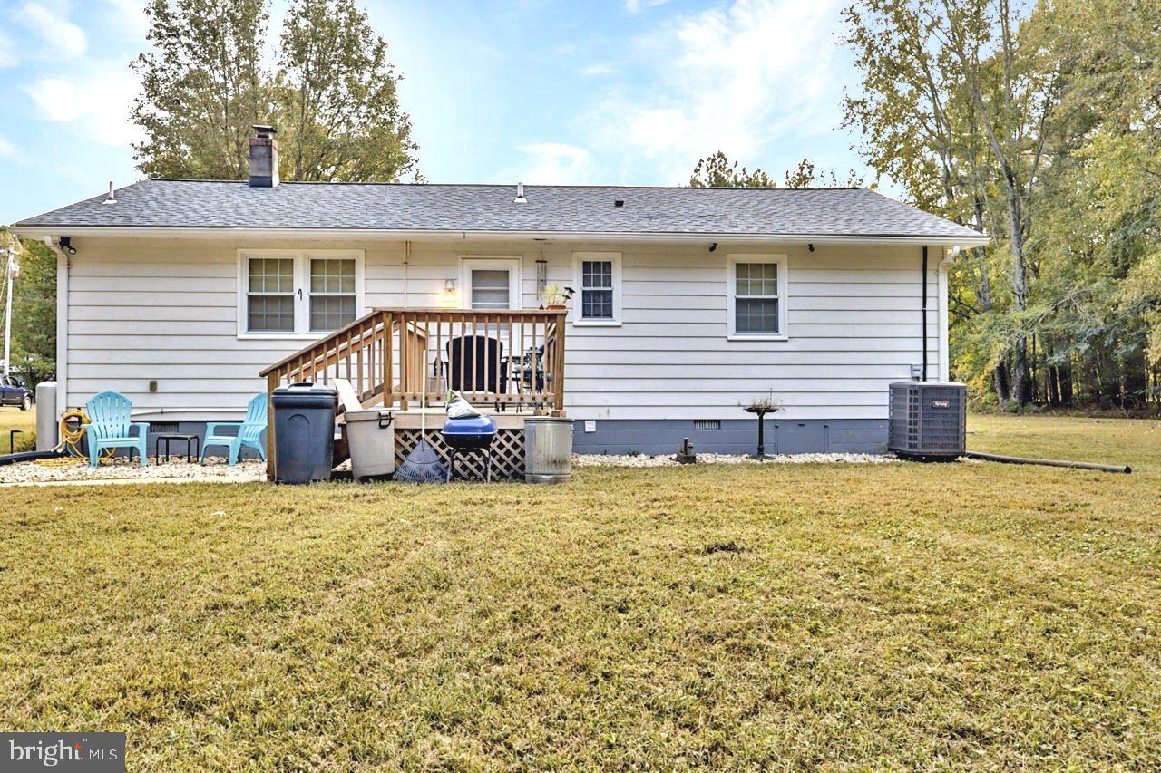 38340 Sugar Hole Road Avenue, MD 20609 - Photo 22 of 32 a view of a house with a yard and deck