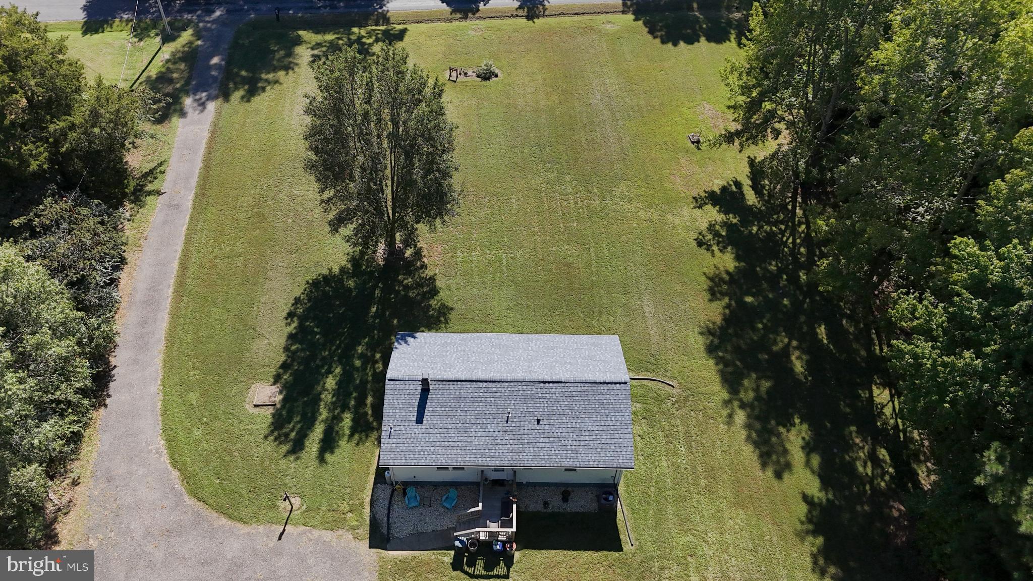 38340 Sugar Hole Road Avenue, MD 20609 - Photo 30 of 32 an aerial view of a residential houses with outdoor space
