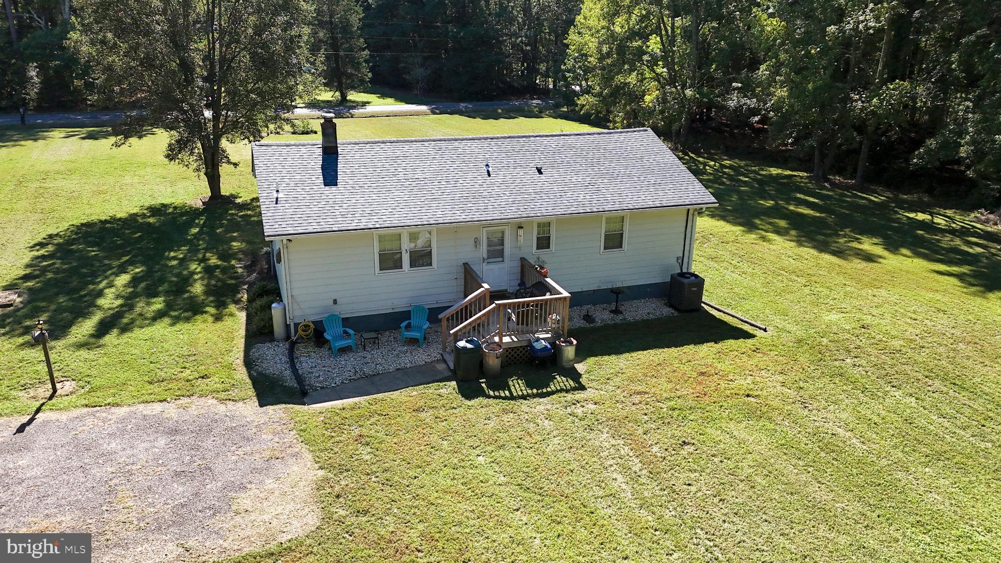 38340 Sugar Hole Road Avenue, MD 20609 - Photo 3 of 32 a front view of a house with a yard