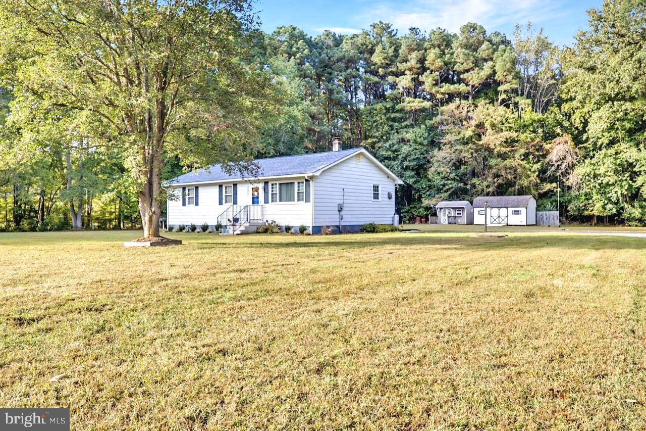 38340 Sugar Hole Road Avenue, MD 20609 - Photo 31 of 32 a house view with a swimming pool
