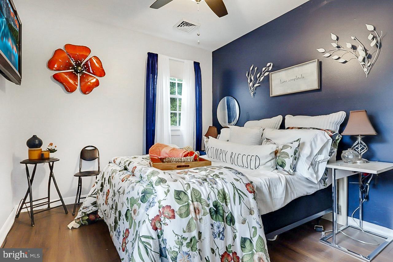 38340 Sugar Hole Road Avenue, MD 20609 - Photo 7 of 32 a bedroom with bed and window