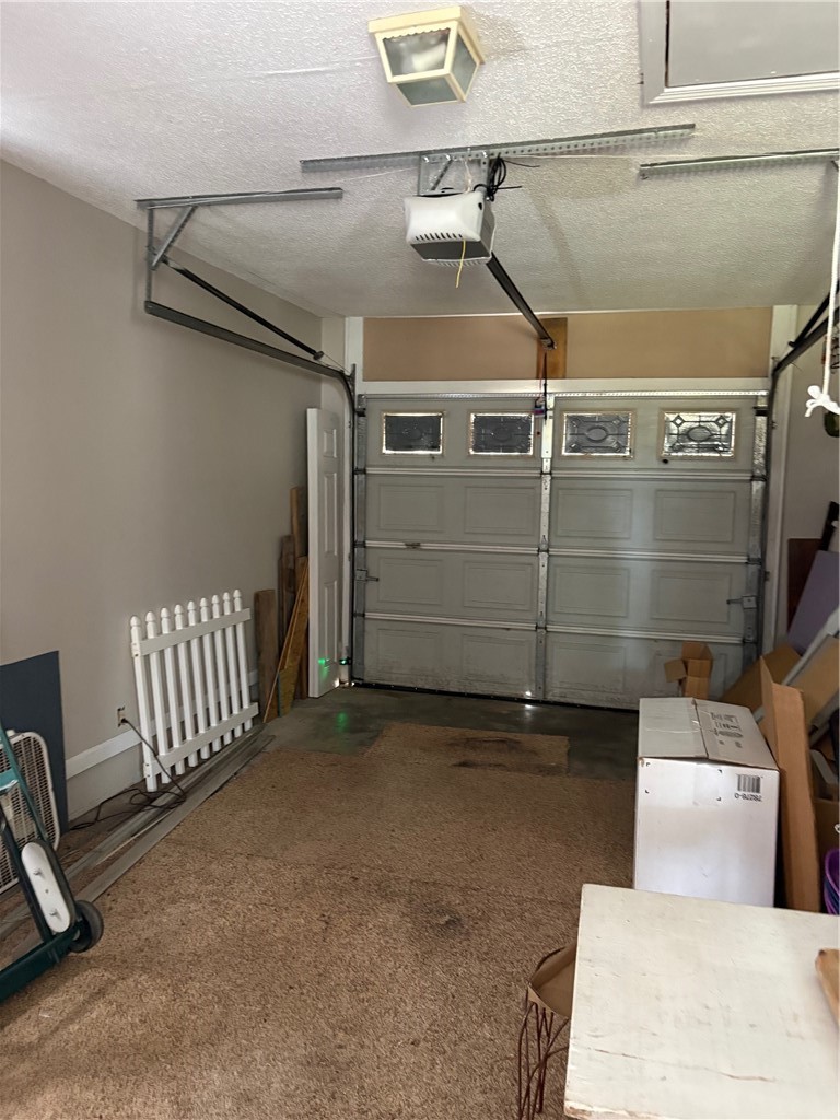6663 Pine Ridge Circle Blackshear, GA 31516 - Photo 32 of 37 Garage with automatic door opener