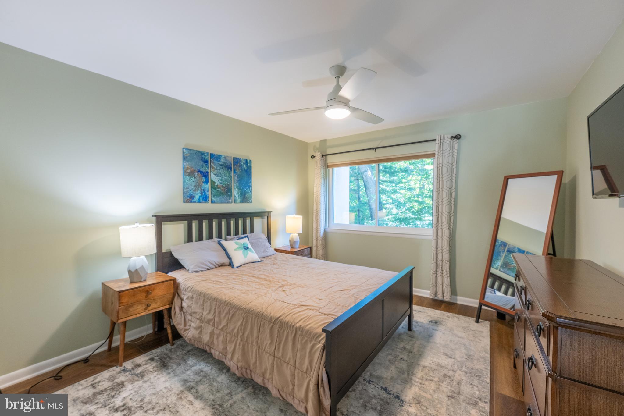 11917 Barrel Cooper Court Reston, VA 20191 - Photo 25 of 59 a bed room with a bed and a window