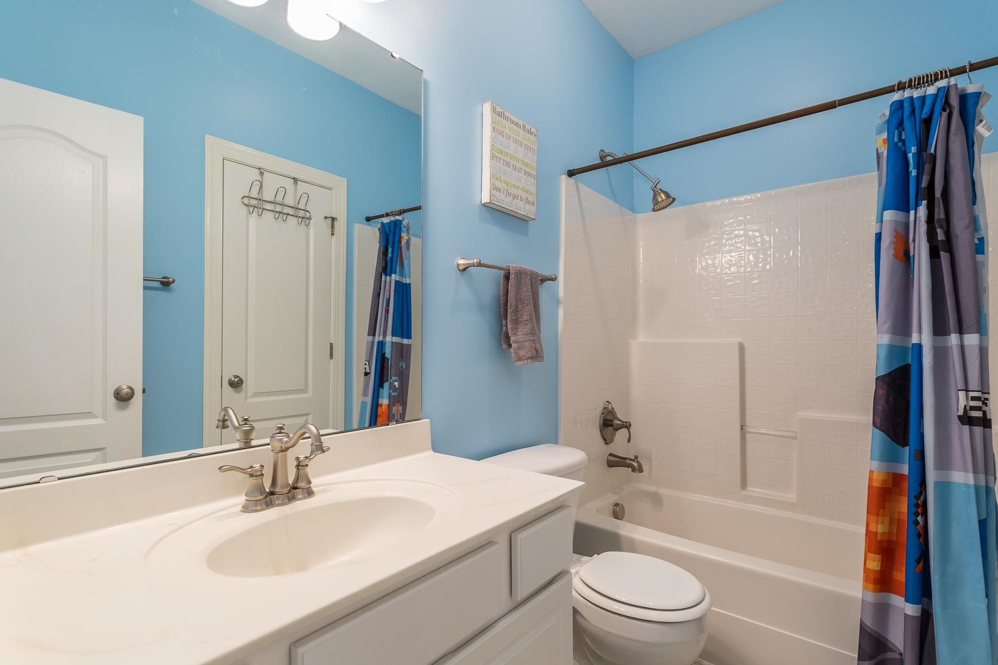 10009 Darling Street Raleigh, NC 27613 - Photo 24 of 35 Hall Bathroom