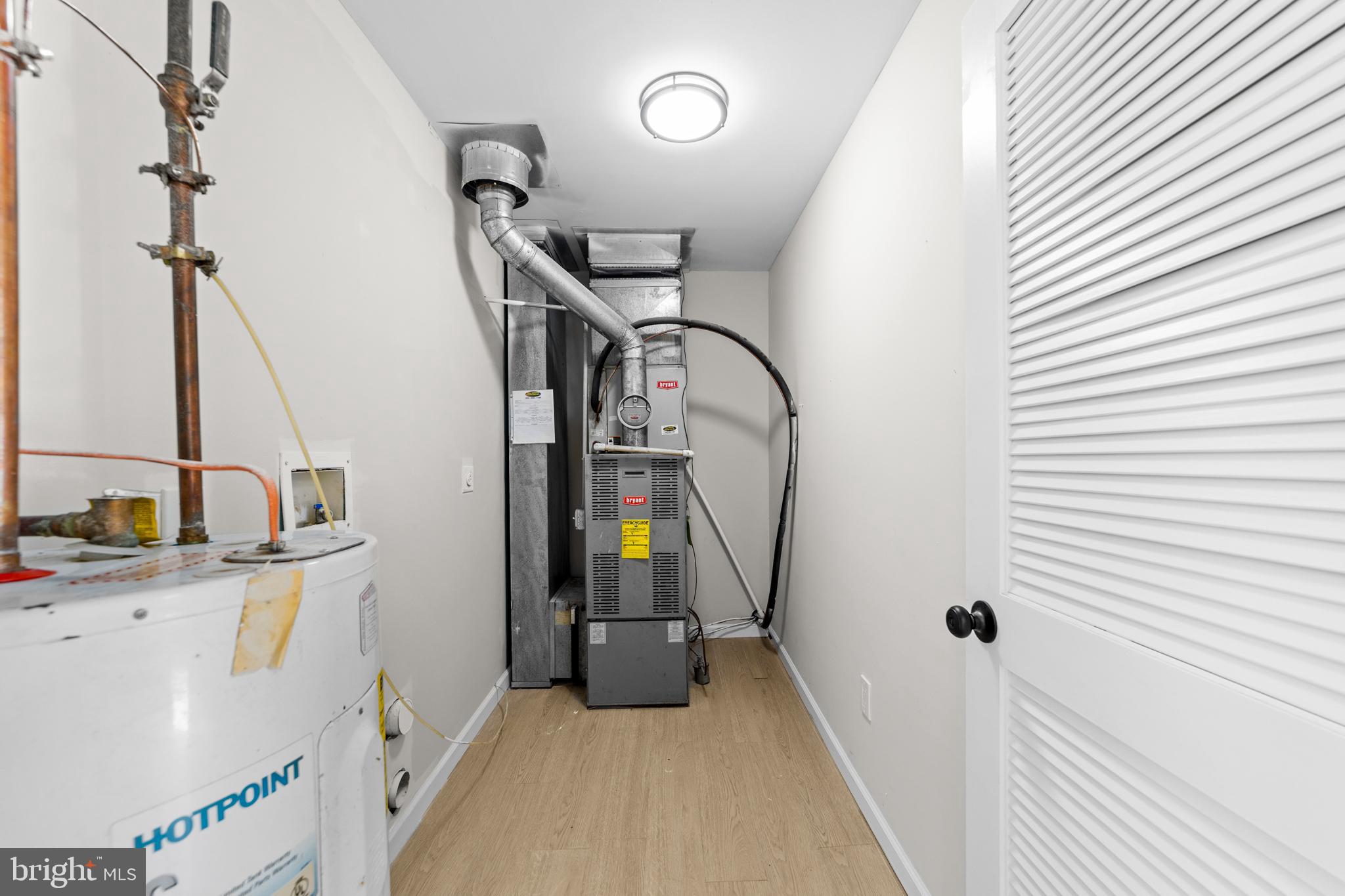 33 Pinewood Avenue Carneys Point, NJ 08069 - Photo 12 of 24 a view of a livingroom with furniture and staircase