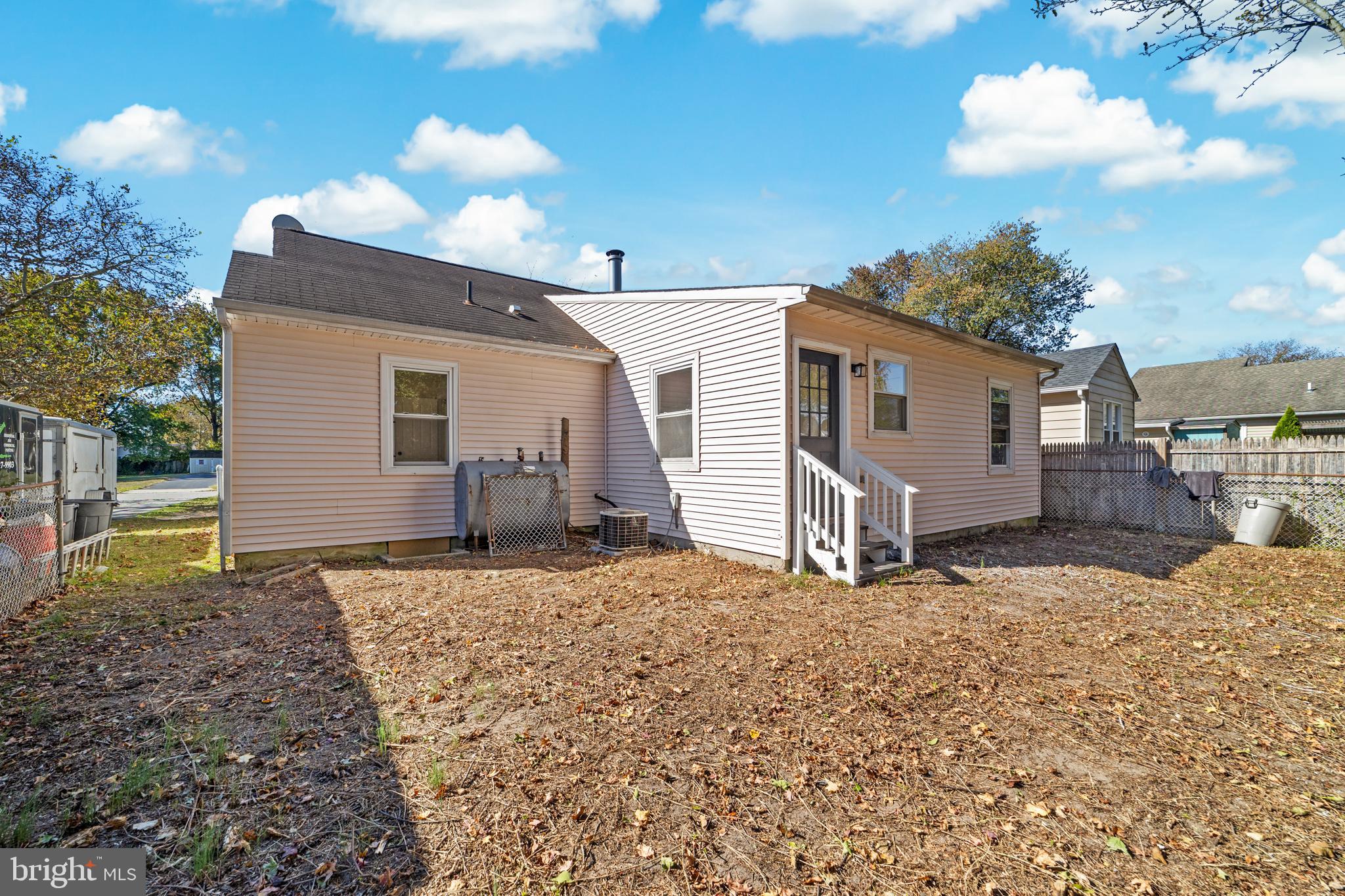 33 Pinewood Avenue Carneys Point, NJ 08069 - Photo 18 of 24 a view of a house with a yard