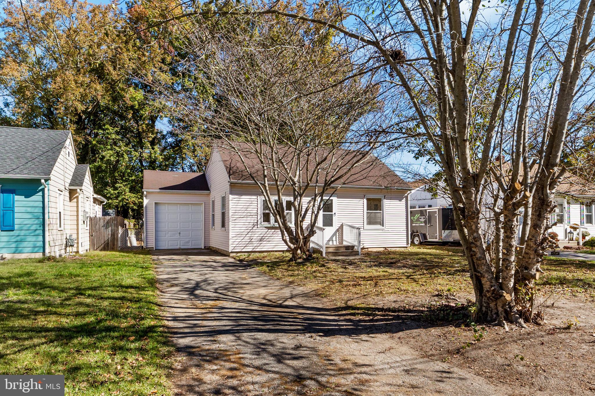 33 Pinewood Avenue Carneys Point, NJ 08069 - Photo 19 of 24 a view of a house with a yard