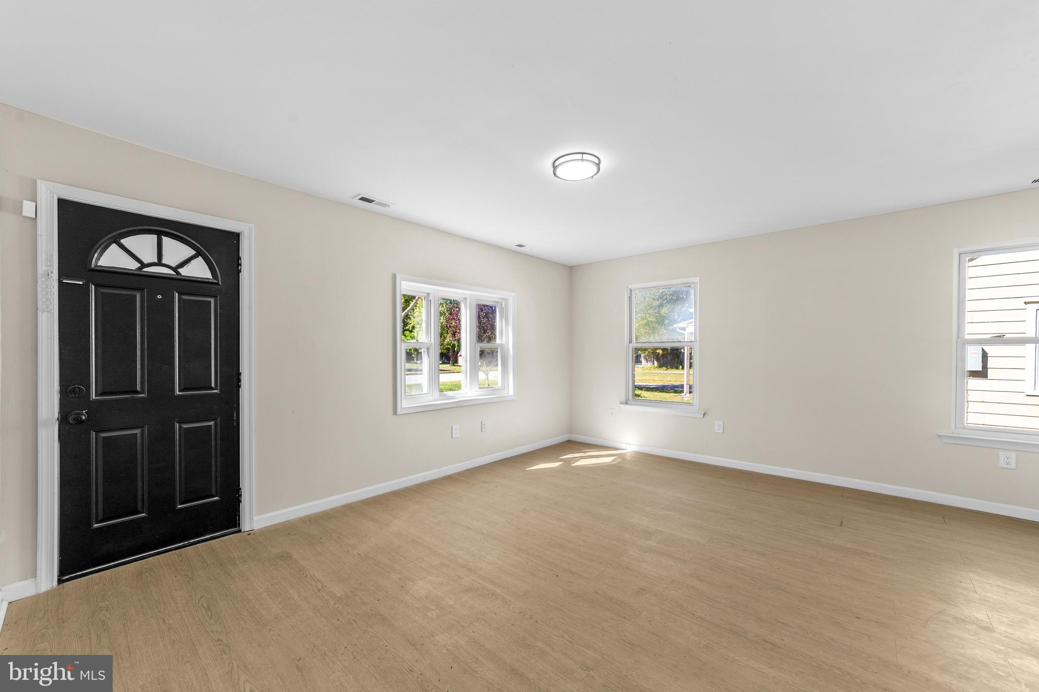 33 Pinewood Avenue Carneys Point, NJ 08069 - Photo 3 of 24 a view of an empty room with a window
