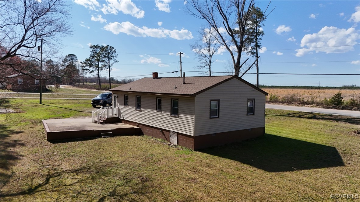2502 Dry Bread Road Emporia, VA 23847 - Photo 3 of 14 a front view of a house with a yard