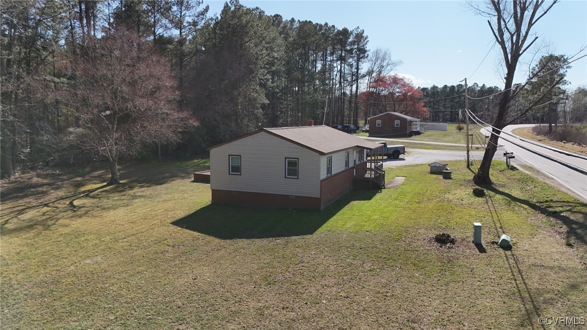 2502 Dry Bread Road Emporia, VA 23847 - Photo 4 of 14 a view of a house with a yard and tree s