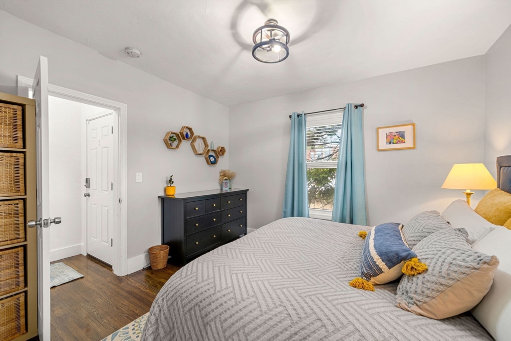 104 Stetson Avenue, Unit 2 Swampscott, MA 01907 - Photo 24 of 33 a bedroom with a bed and a window